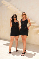 Conjunto Blusa com Botões e Saia Detalhe Cós